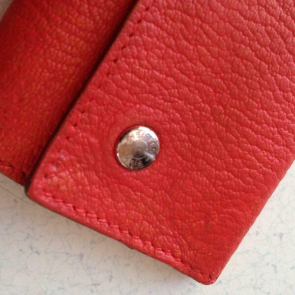 Authentic, Hermes Tangerine Leather 6-Hooks Key Case 4in x 2.5in