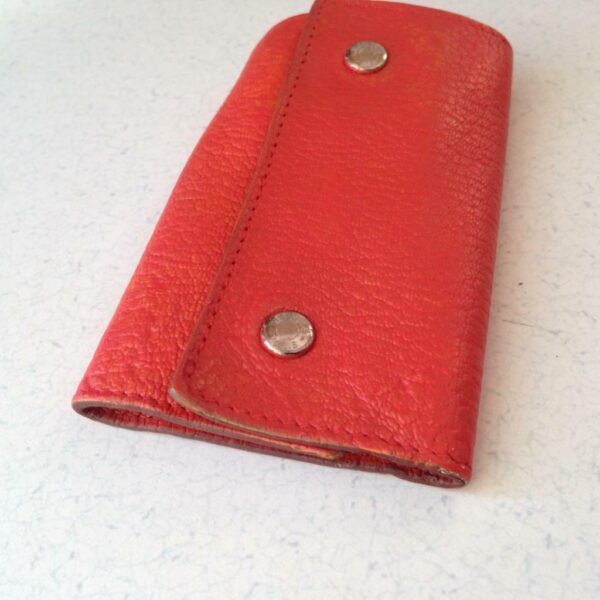 Authentic, Hermes Tangerine Leather 6-Hooks Key Case 4in x 2.5in