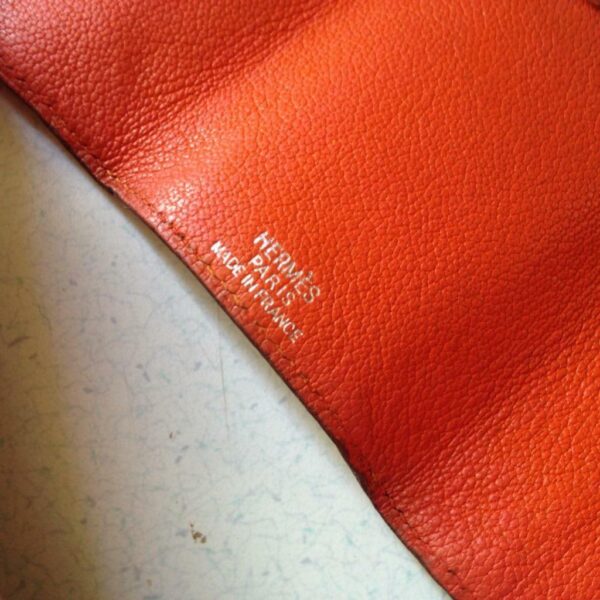 Authentic, Hermes Tangerine Leather 6-Hooks Key Case 4in x 2.5in