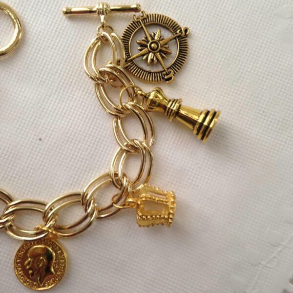 Gold Tone, 7pc Charm Bracelet or Handbag Charm