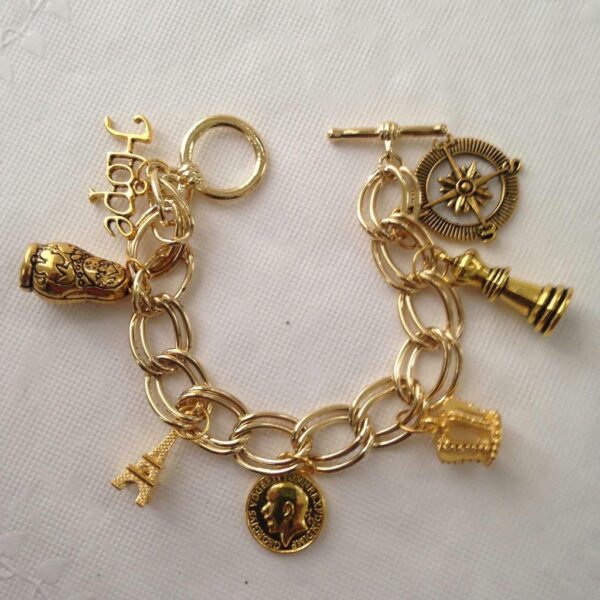 Gold Tone, 7pc Charm Bracelet or Handbag Charm