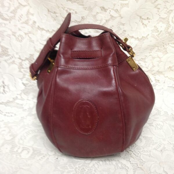 Authentic, Cartier Burgundy Leather Drawstring Shoulder Bag 9in H x 6in D