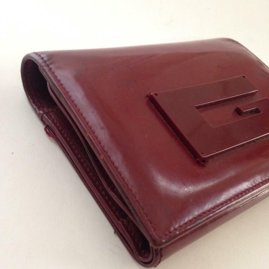 Authentic, Gucci Burgundy Enamel Tri-fold Wallet 5.5in x 4in