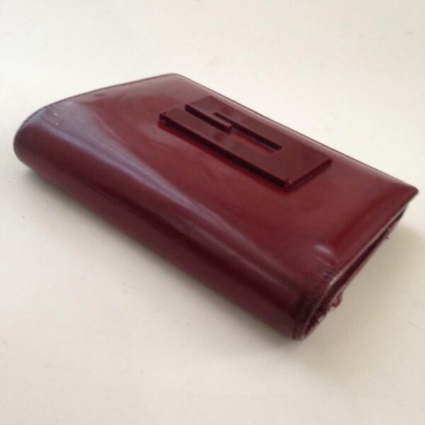 Authentic, Gucci Burgundy Enamel Tri-fold Wallet 5.5in x 4in