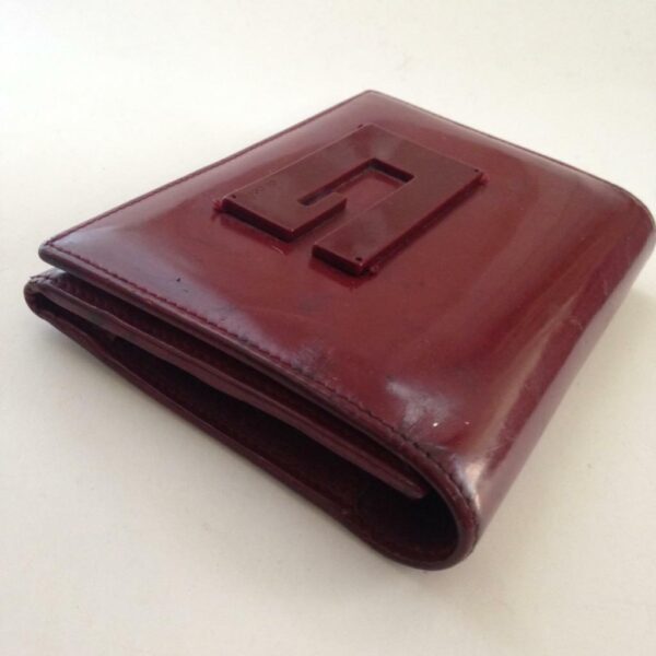 Authentic, Gucci Burgundy Enamel Tri-fold Wallet 5.5in x 4in