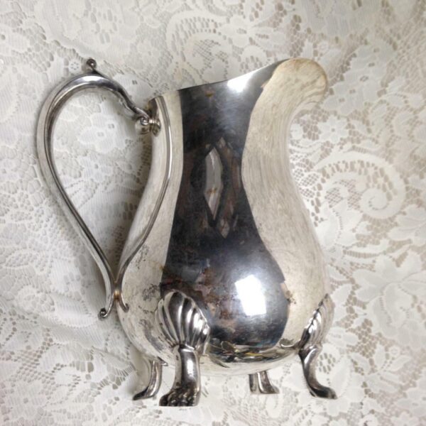 Vintage Leonard Silver Plated Footed Pitcher with Ice Guard 9n x 8in