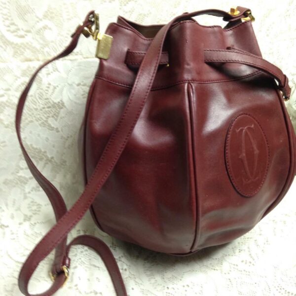 Authentic, Cartier Burgundy Leather GM Drawstring Shoulder Bag 13in x 13in x 7in