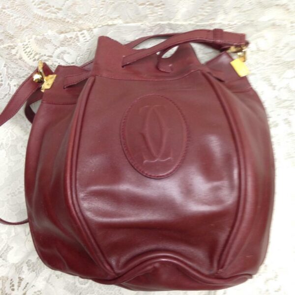 Authentic, Cartier Burgundy Leather GM Drawstring Shoulder Bag 13in x 13in x 7in