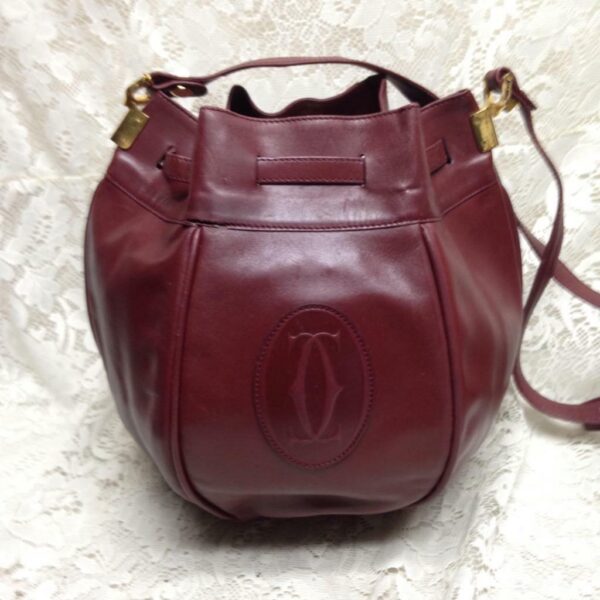 Authentic, Cartier Burgundy Leather GM Drawstring Shoulder Bag 13in x 13in x 7in