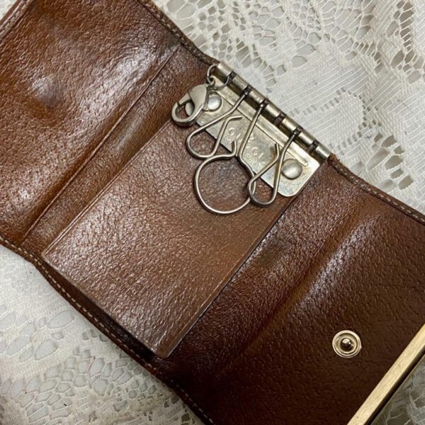 Authentic, Gucci Brown Mono 4-Hooks Key Case 3.5in x 2.5 in (T0322)