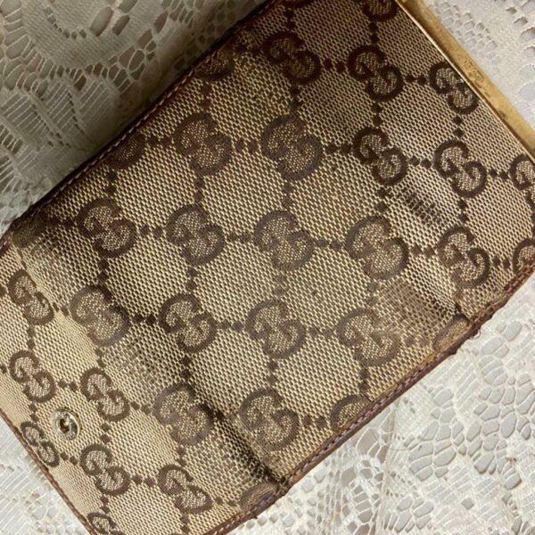 Authentic, Gucci Brown Mono 4-Hooks Key Case 3.5in x 2.5 in (T0322)