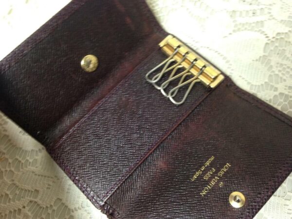 Authentic, Louis Vuitton, Burgundy Taiga Leather 4-Hooks Key Case 4.25in x 2.5in