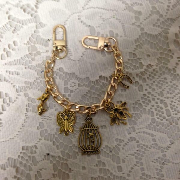 Beautiful GoldTone 5-Charm Bracelet (Butterfly, Shoes, Bee, Birdcage, Horseshoe)