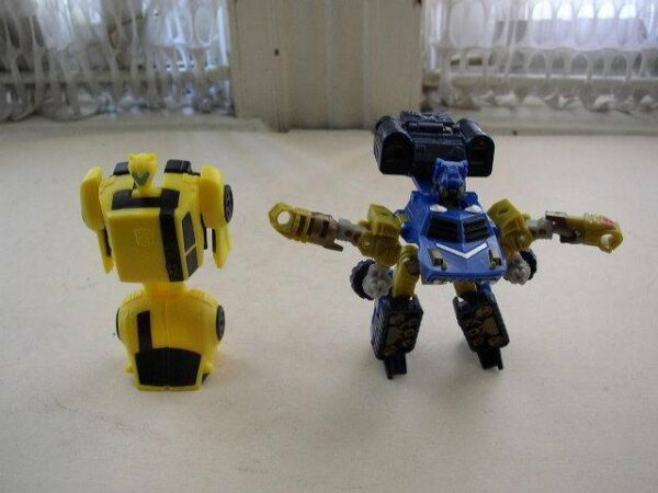 Lot of 2 Yellow and Blue Car Transformers (#03)