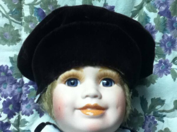 Vintage, 18in Boy Porcelain Doll in Green Swearer and Hat