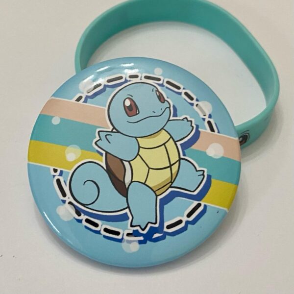 Lot of 8 Pokemon Collectibles. (F)