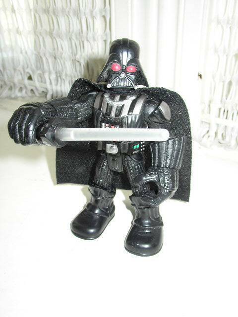 2004 Hasbro, Starwars Lucas Film Ltd; 7” x 5” Vader with Sword