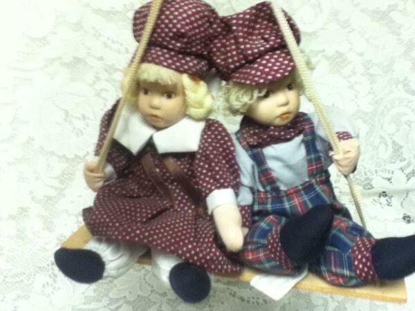 Beautiful, 9-inch, Dutch Boy And Girl Dolls on a Swing