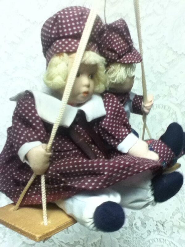 Beautiful, 9-inch, Dutch Boy And Girl Dolls on a Swing