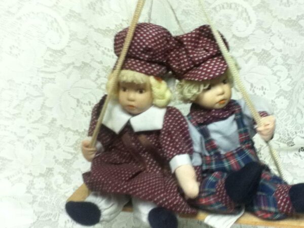 Beautiful, 9-inch, Dutch Boy And Girl Dolls on a Swing