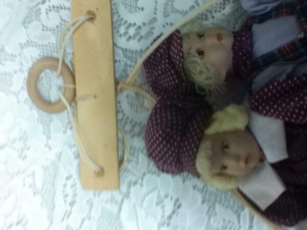 Beautiful, 9-inch, Dutch Boy And Girl Dolls on a Swing