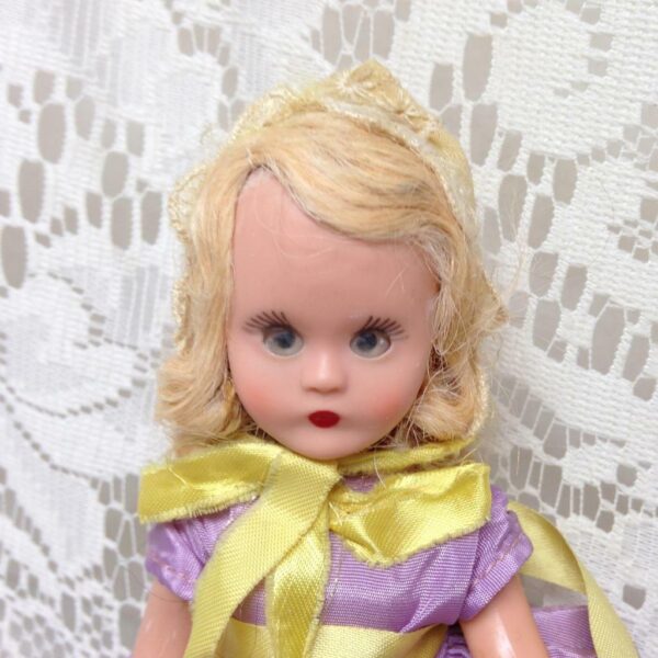 Vintage1940-50s 5.5in Nancy Ann Story Book Doll in Purple and Yellow Gown n Hat