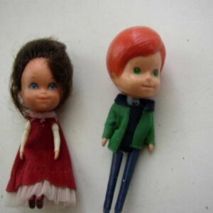 Pair of 1980 Mattel Inc. Miniature Dolls in Burgundy and Green Attire