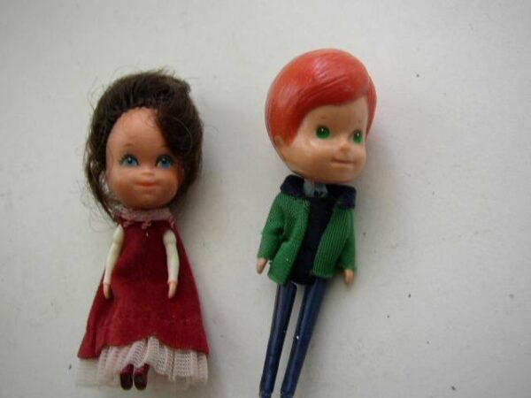 Pair of 1980 Mattel Inc. Miniature Dolls in Burgundy and Green Attire