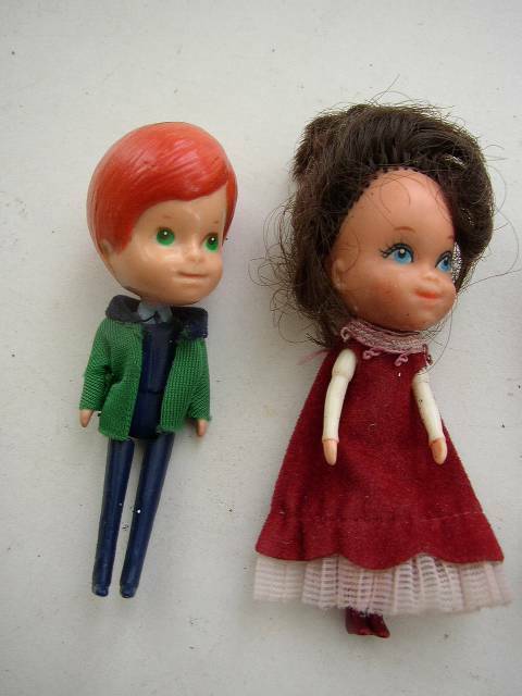 Pair of 1980 Mattel Inc. Miniature Dolls in Burgundy and Green Attire