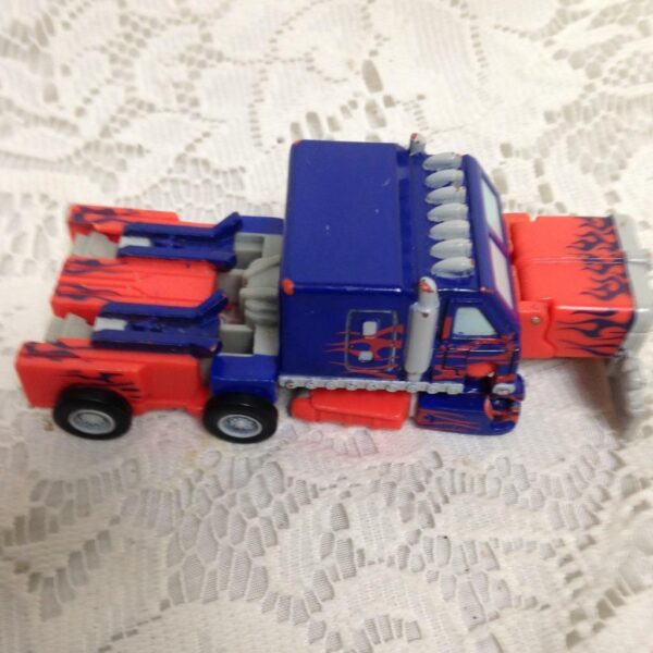 Transformers Octomus Prime, Orange and Black Truck 4in x 2in x 1.5in