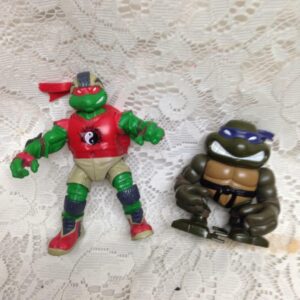 2pc Ninja Turtles- 2003 Skating Raphael and 2005 Playmates Wind Up Donatello