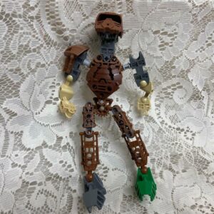 Vintage, Rare, Lego, Bionicle Brown Action Figure with Silver Spear 8in x 5in