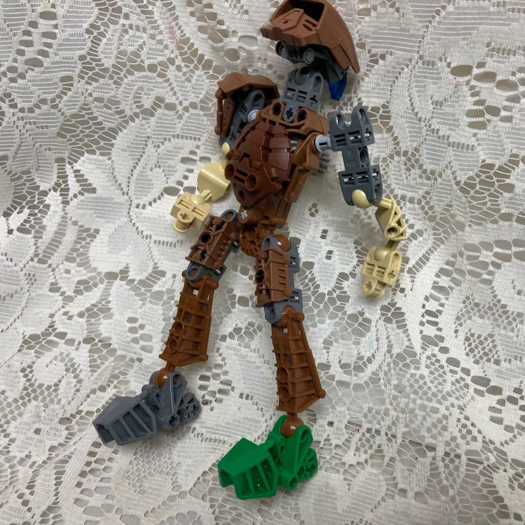 Vintage, Rare, Lego, Bionicle Brown Action Figure with Silver Spear 8in x 5in