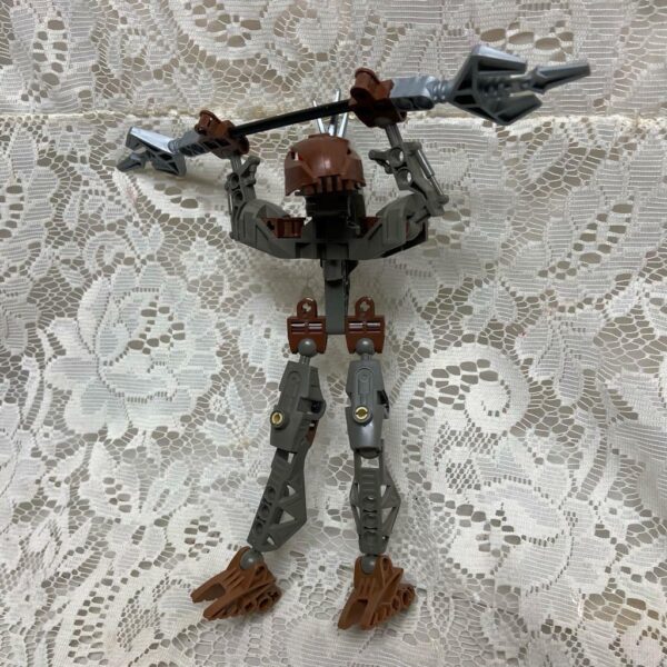 Vintage, Rare, Lego, Bionicle Brown Action Figure with Silver Spear 8in x 9in