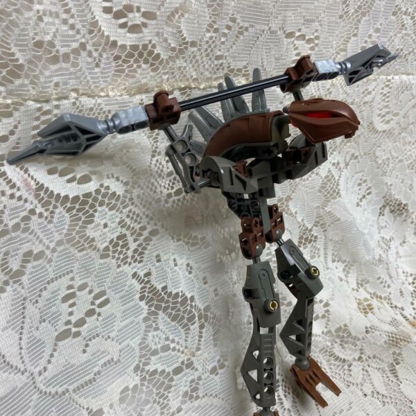 Vintage, Rare, Lego, Bionicle Brown Action Figure with Silver Spear 8in x 9in