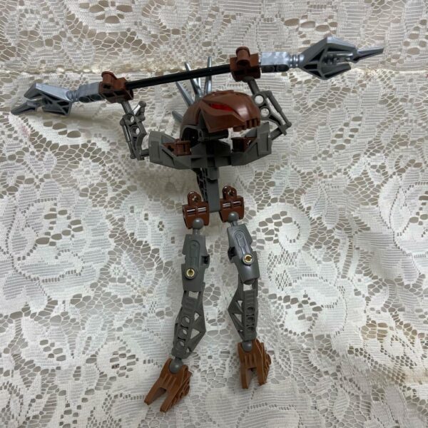 Vintage, Rare, Lego, Bionicle Brown Action Figure with Silver Spear 8in x 9in