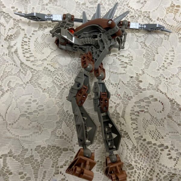 Vintage, Rare, Lego, Bionicle Brown Action Figure with Silver Spear 8in x 9in