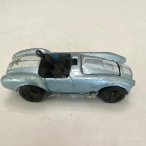 Vintage Hotwheels-Mattel Inc. 1983 blue and white striped sports car