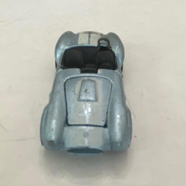 Vintage Hotwheels-Mattel Inc. 1983 blue and white striped sports car