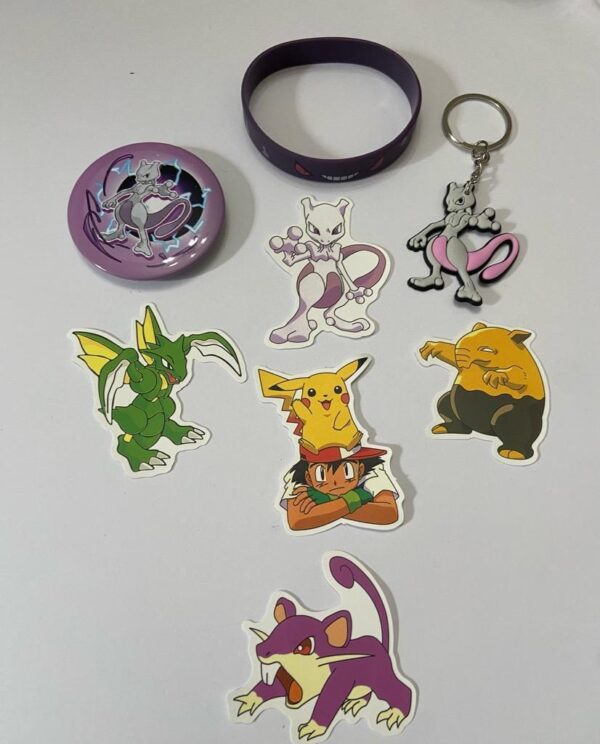 Lot of 8 Pokemon Collectibles. (B)