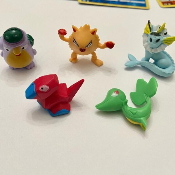 Lot (D) 3 Pokemon Reverse Holo Cards and 5 Pokemon Figures