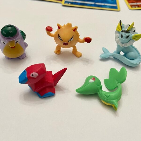 Lot (D) 3 Pokemon Reverse Holo Cards and 5 Pokemon Figures