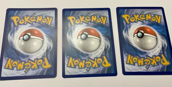 Lot (D) 3 Pokemon Reverse Holo Cards and 5 Pokemon Figures