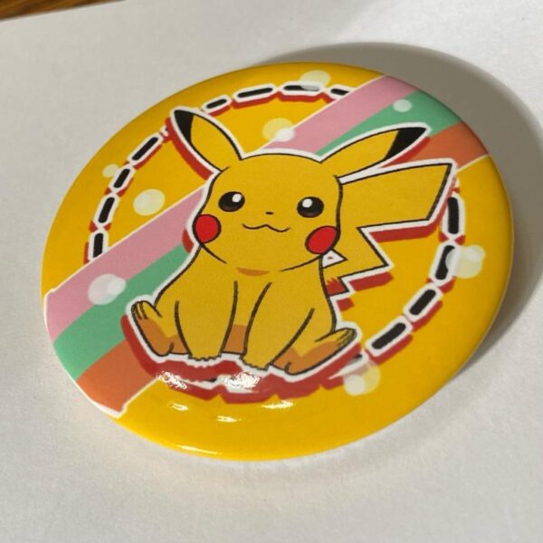 Lot of 8 Pokemon Collectibles. (A)