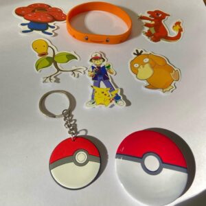 Lot of 8 Pokemon Collectibles. (J)