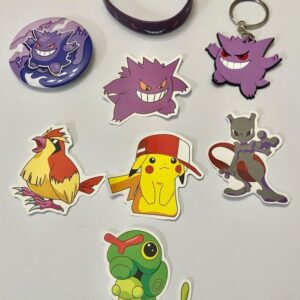 Lot of 8 Pokemon Collectibles. (G)