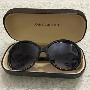 Vintage, Louis Vuitton Stripe, Grayish-Purple Sunglasses This is a pre-owned gr