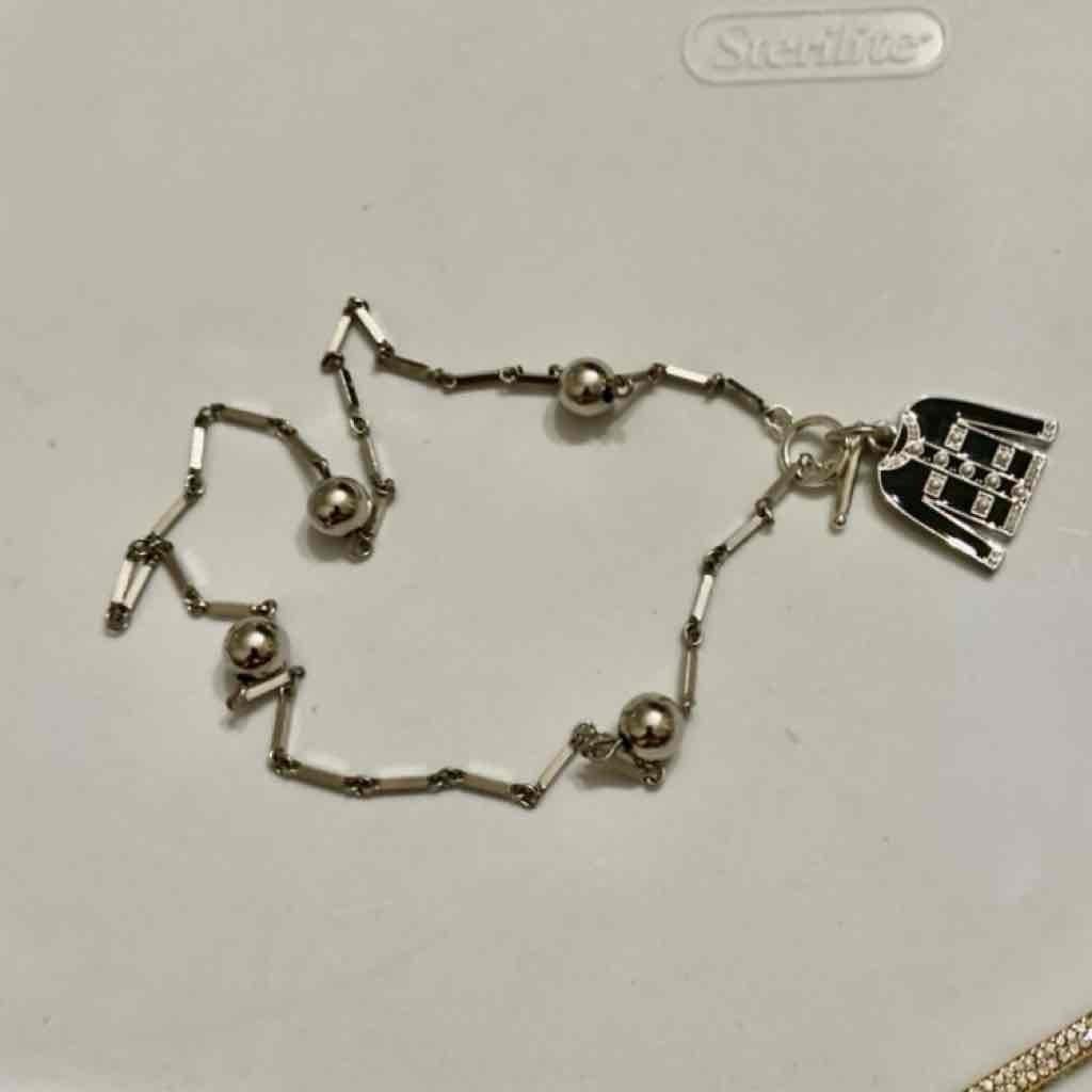 Karl Lagerfeld Silver Tone 18-inch Necklace with Black Cardigan Pendant